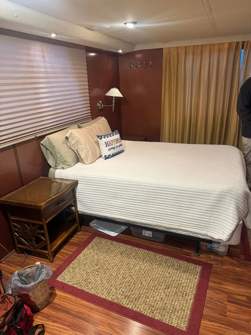 Slide: The Image of Cozy bedroom in a 2006 Gibson 5500 boat. - 18