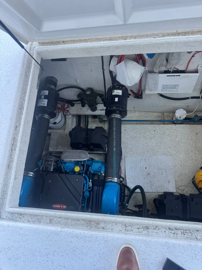 Slide: The Image of Engine compartment of a 2006 Gibson 5500 boat. - 2