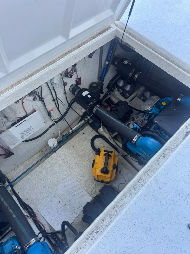 Slide: The Image of Engine compartment of a 2006 Gibson 5500 boat. - 3