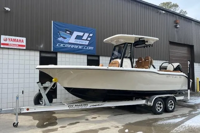 The Image of 2026 Key West 239 FSR boat on trailer outside marine dealership. - 0