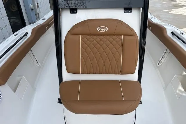 Slide: The Image of 2026 Key West 239 FSR boat seat with brown leather upholstery and diamond stitching. - 32