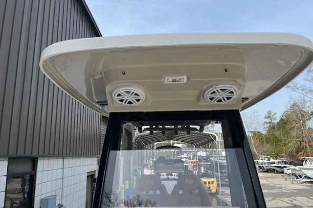 Slide: The Image of 2026 Key West 239 FSR boat with T-top speakers at a marina. - 33