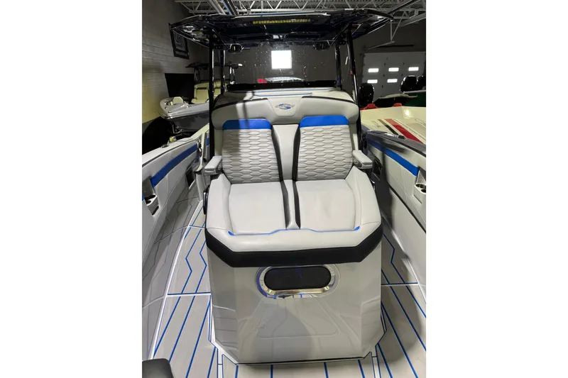 Slide: The Image of 2025 Sunsation 32 CCX boat interior with modern seating and sleek design. - 7