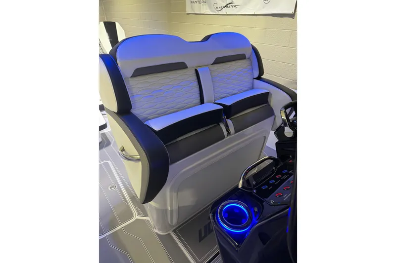 Slide: The Image of 2026 Sunsation 32 CCX boat interior with modern seating and illuminated controls. - 13