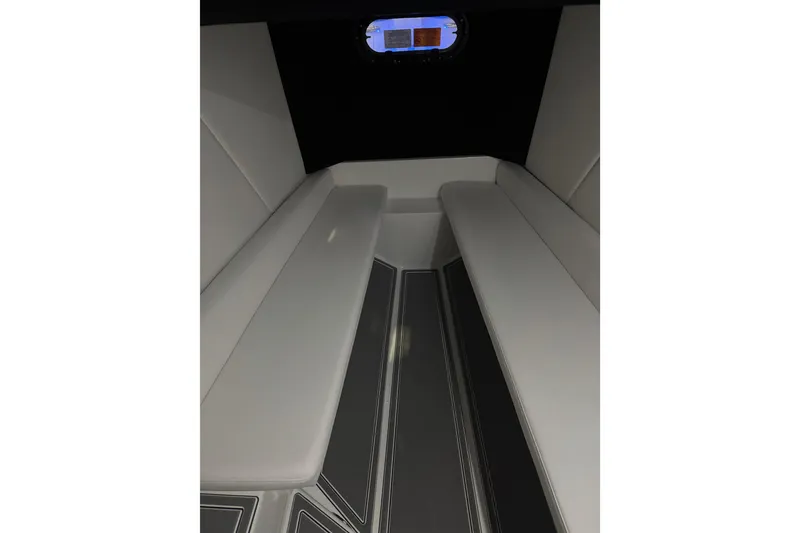 Slide: The Image of Interior cabin of 2026 Sunsation 32 CCX boat with sleek seating and window. - 21