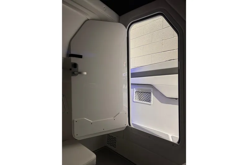 Slide: The Image of Interior view of 2026 Sunsation 32 CCX cabin door and wall design. - 22