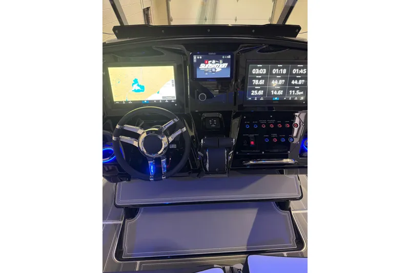 Slide: The Image of 2026 Sunsation 32 CCX boat dashboard with advanced navigation and control systems. - 23