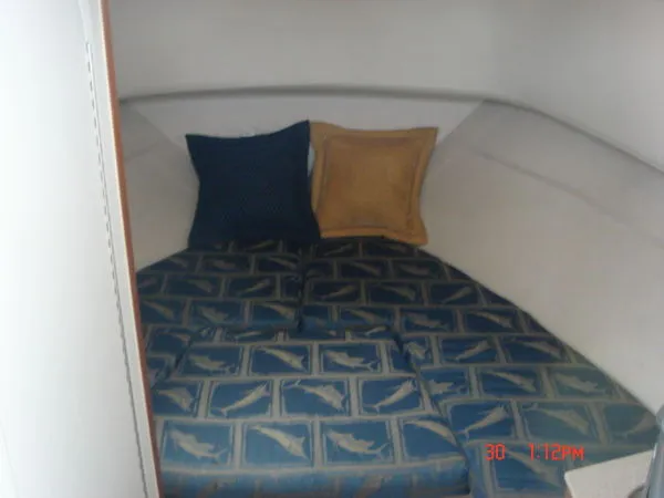 Slide: The Image of Pursuit 3070 Offshore Center Console 2002 - 11