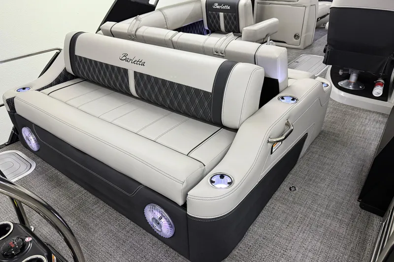 Slide: The Image of Luxurious interior of 2026 Barletta Lusso 25UA pontoon boat with plush seating. - 11