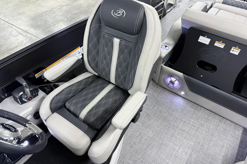 Slide: The Image of Luxurious interior of 2026 Barletta Lusso 25UA with premium seating and modern controls. - 32