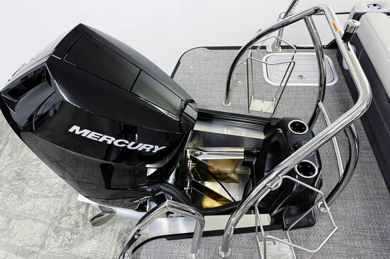 Slide: The Image of 2026 Barletta Lusso 25UA boat with Mercury outboard motor, featuring sleek design and modern amenities. - 6