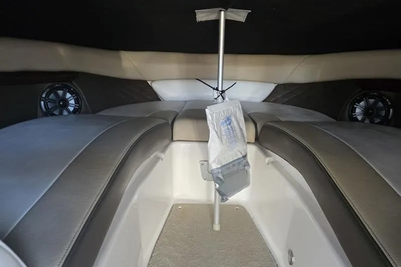 Slide: The Image of Interior view of 2013 Regal 2700 ES Bowrider boat with seating and speakers. - 12