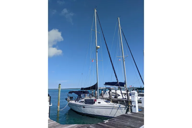 Slide: The Image of Catalina 350 MkII sailboat docked at marina, clear blue sky, 2005 model. - 1