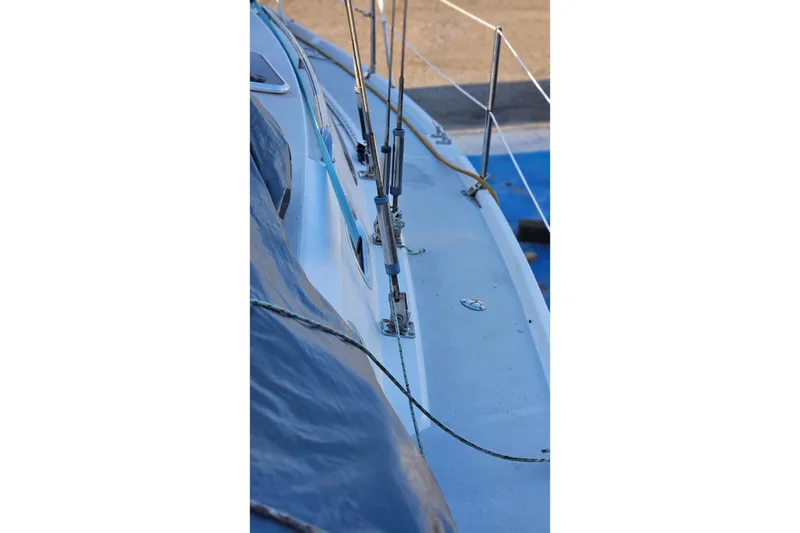 Slide: The Image of Side view of a 2005 Catalina 350 sailboat deck with rigging details. - 11