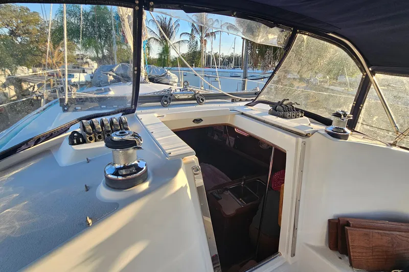 Slide: The Image of Cockpit view of a 2005 Catalina 350 sailboat with winches and navigation equipment. - 15