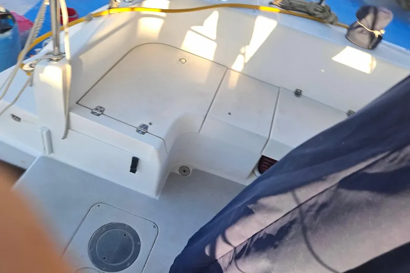 Slide: The Image of Interior of a 2005 Catalina 350 yacht with seating area. - 18