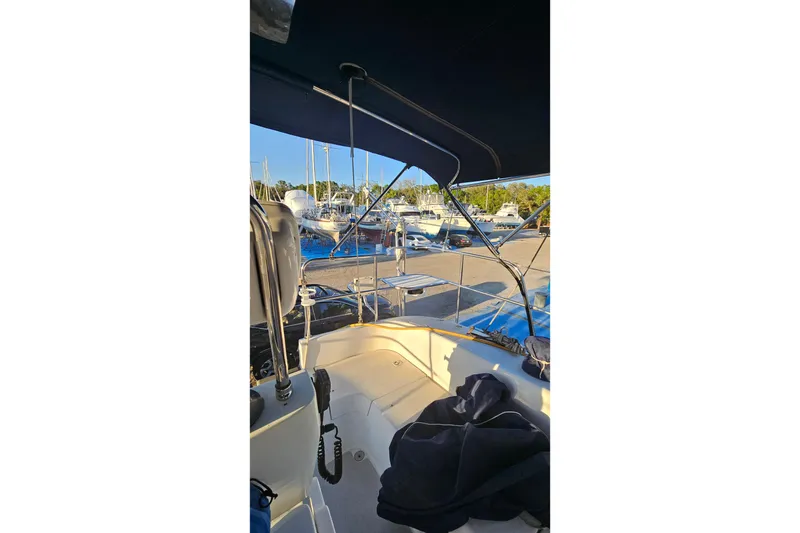 Slide: The Image of Cockpit view of 2005 Catalina 350 sailboat docked at marina. - 25