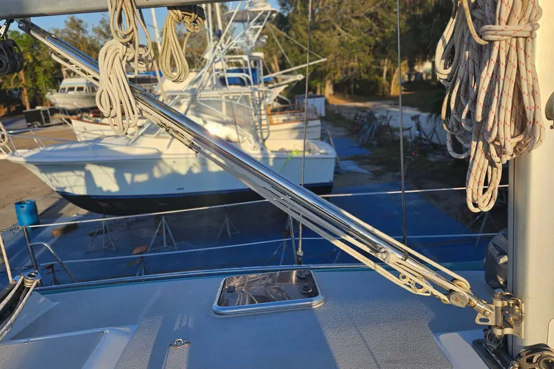 Slide: The Image of Sailboat deck with rigging and ropes, Catalina 350, 2005 model, in a marina setting. - 28
