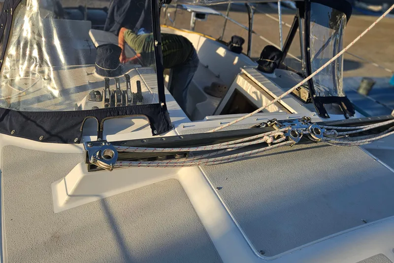 Slide: The Image of Cockpit view of a 2005 Catalina 350 sailboat with rigging and canopy. - 29