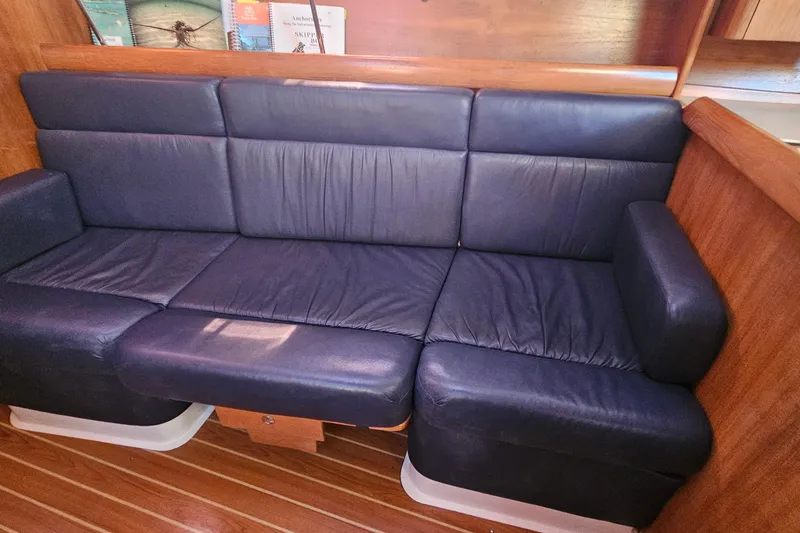 Slide: The Image of Luxurious navy leather seating in 2005 Catalina 350 yacht interior. - 34