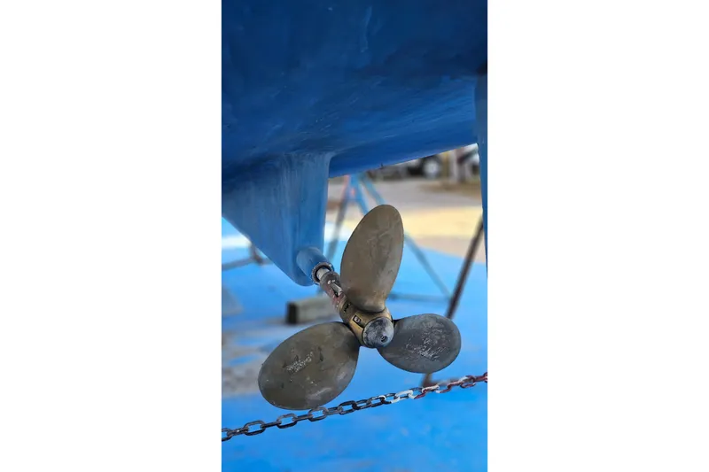 Slide: The Image of Propeller of a 2005 Catalina 350 sailboat on a blue-painted hull. - 67
