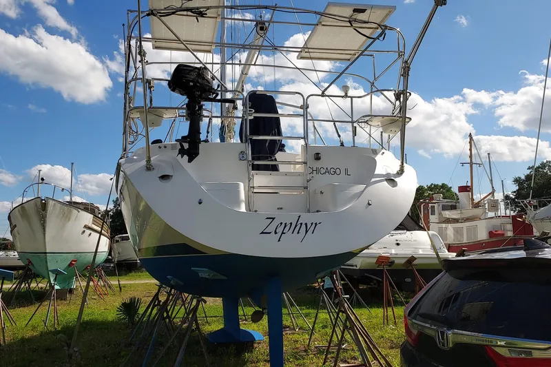 Slide: The Image of 2005 Catalina 350 MkII sailboat "Zephyr" on stands, clear sky background. - 9