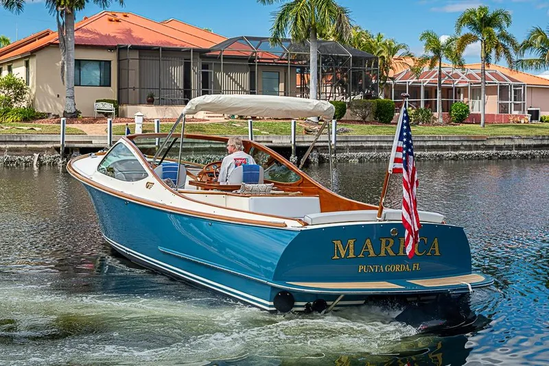 Slide: The Image of Engine compartment of a 2004 Hinckley Talaria 29 R, showcasing wiring and components. - 14
