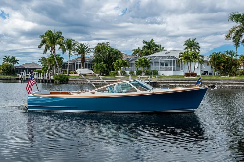 Slide: The Image of 2004 Hinckley Talaria 29 R boat cruising in a canal, Punta Gorda, Florida. - 15