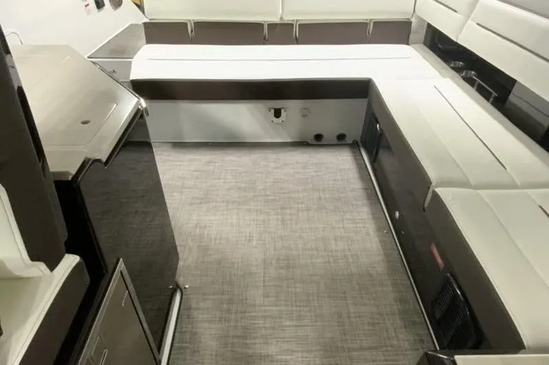 Slide: The Image of Interior of 2022 Cobalt A36BR boat with spacious seating and modern design. - 4