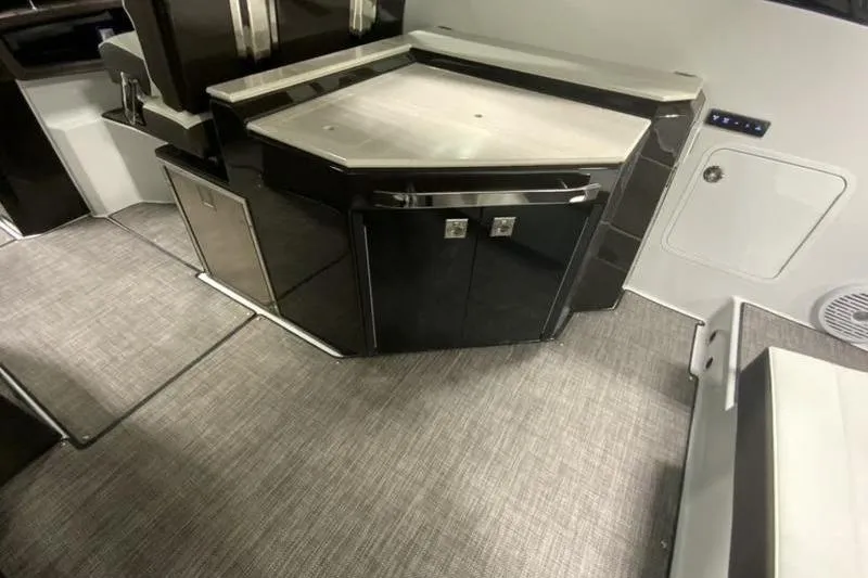 Slide: The Image of 2022 Cobalt A36BR boat interior with sleek cabinetry and modern design. - 9