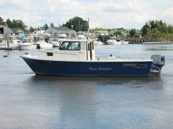 Slide: The Image of Parker Marine 2520 Sport Cabin 1999 - 0