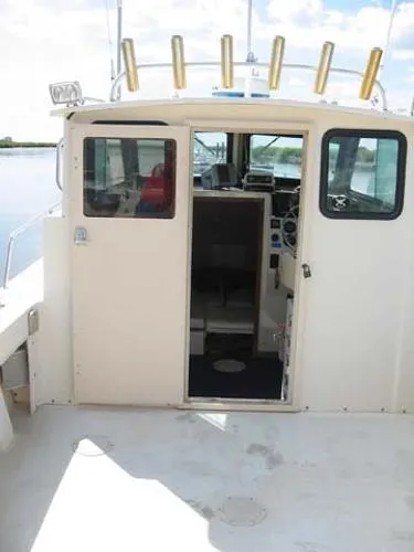 Slide: The Image of Parker Marine 2520 Sport Cabin 1999 - 8