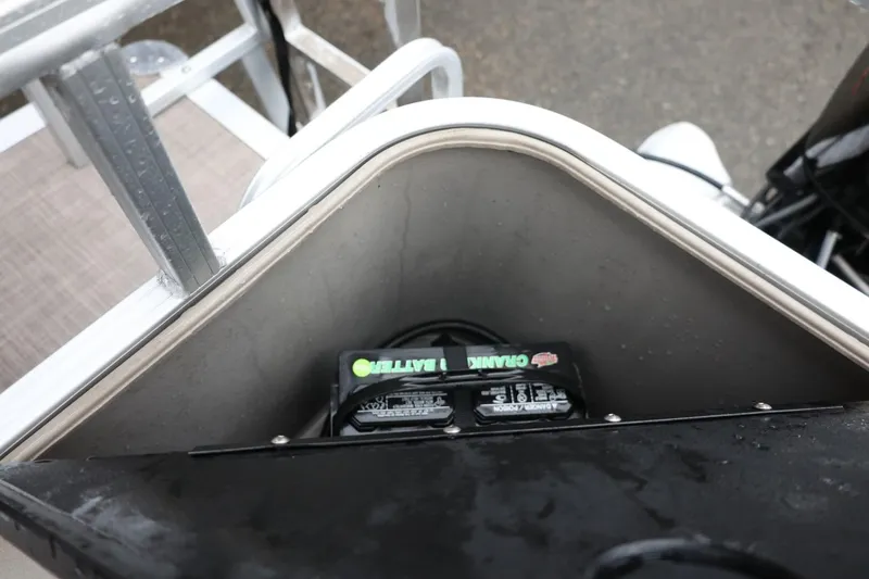 Slide: The Image of Battery compartment of 2022 Sun Tracker Bass Buggy 18 DLX pontoon boat. - 20