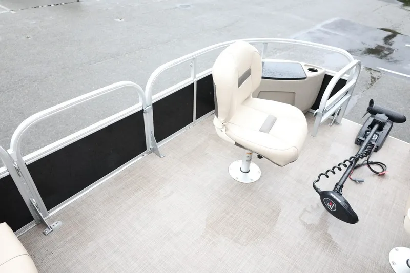 Slide: The Image of 2022 Sun Tracker Bass Buggy 18 DLX pontoon boat with swivel seat and trolling motor. - 23