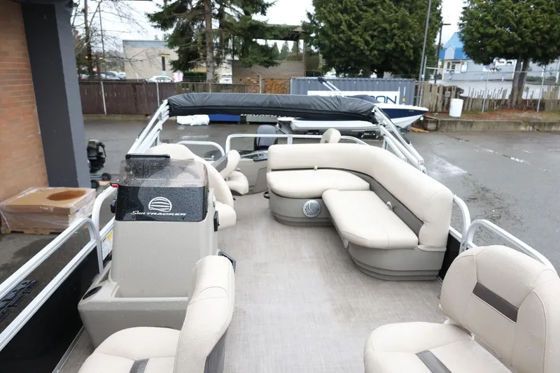 Slide: The Image of 2022 Sun Tracker Bass Buggy 18 DLX pontoon boat with spacious seating and modern design. - 9