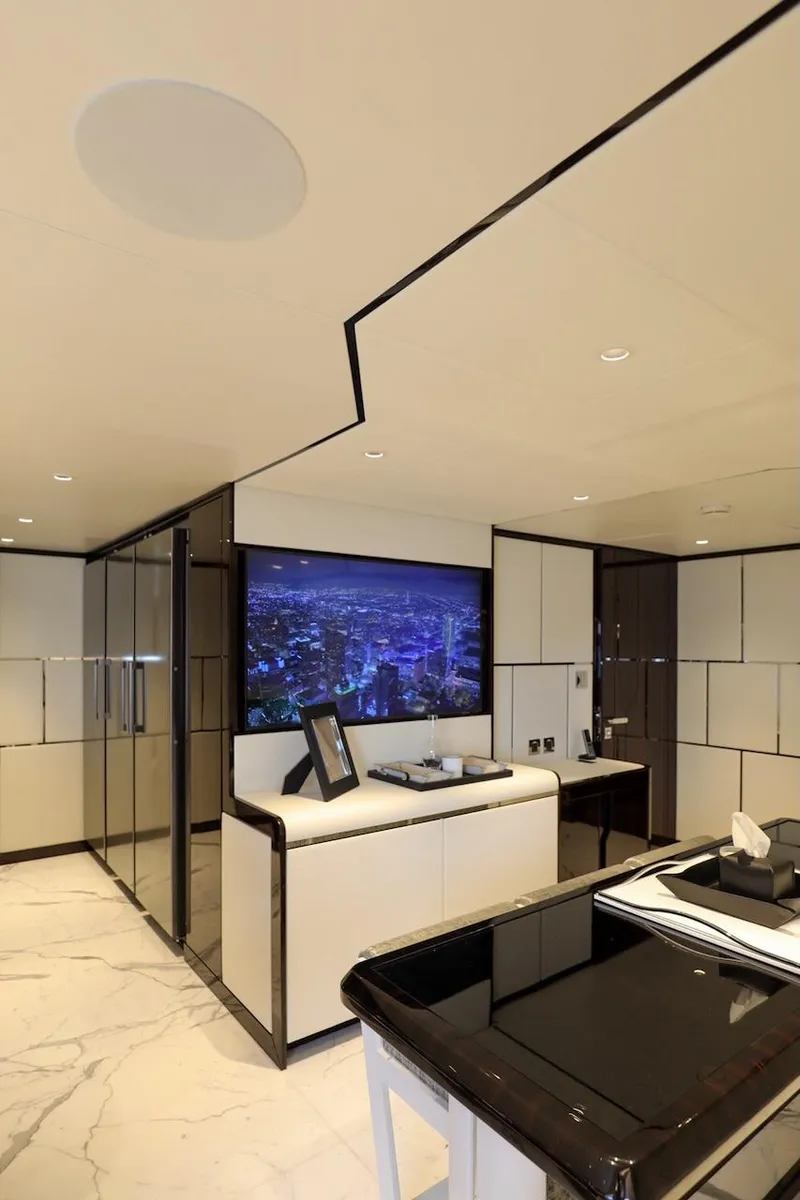 Slide: The Image of Luxurious interior of 2025 Majesty 120 yacht with modern design and elegant furnishings. - 36