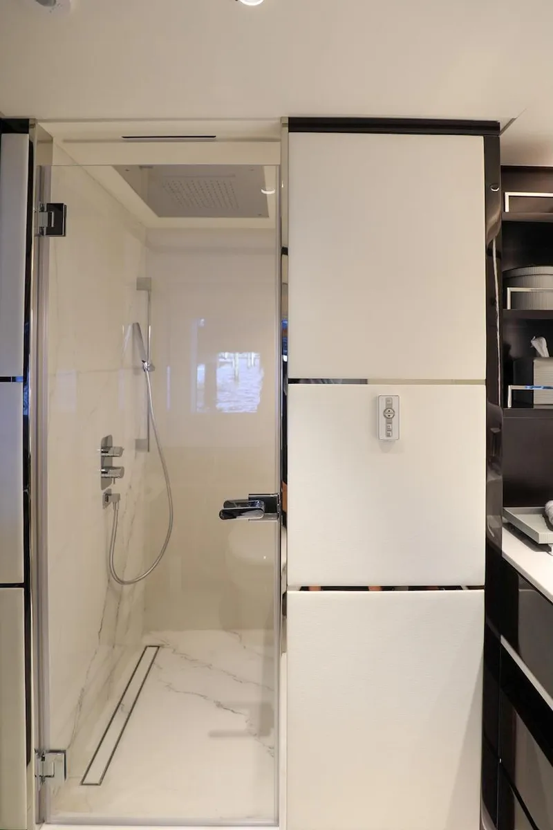 Slide: The Image of Luxurious bathroom in 2025 Majesty 120 yacht with modern shower design. - 42