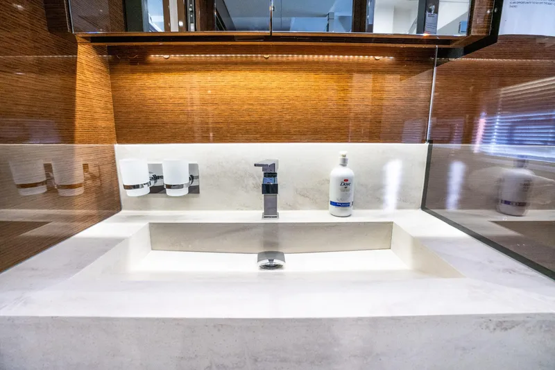 Slide: The Image of Luxurious bathroom sink in 2018 Prestige 630 yacht with modern fixtures and elegant design. - 47