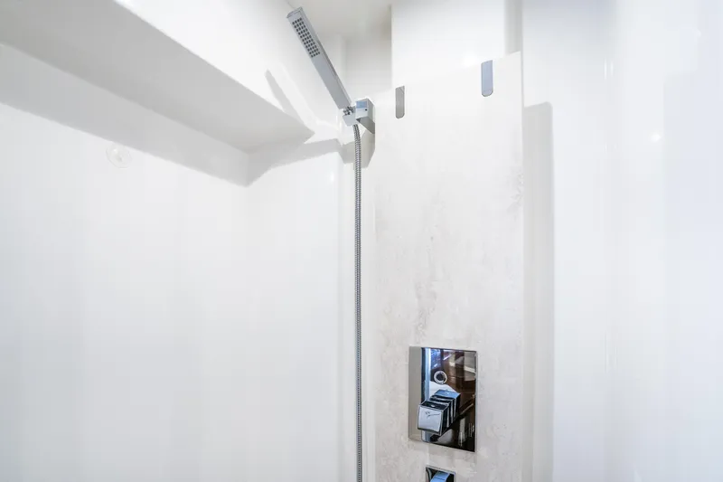 Slide: The Image of Modern shower area in 2018 Prestige 630 yacht with sleek fixtures and minimalist design. - 49