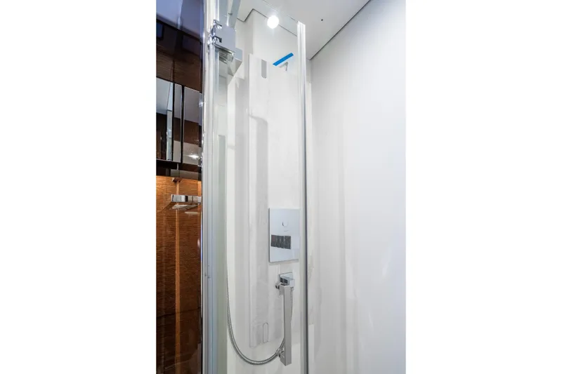 Slide: The Image of Modern shower in 2018 Prestige 630 yacht, featuring sleek glass enclosure and chrome fixtures. - 55