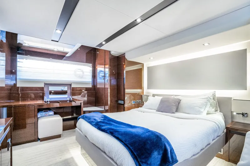 Slide: The Image of Luxurious 2018 Prestige 630 yacht bedroom with modern decor and elegant furnishings. - 64