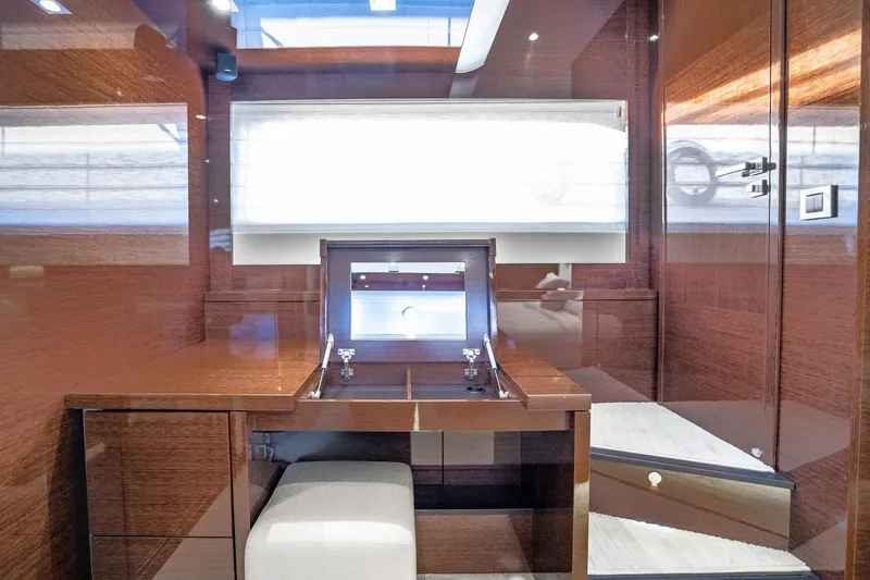 Slide: The Image of Luxurious interior of 2018 Prestige 630 yacht with elegant wood finish and modern design. - 65