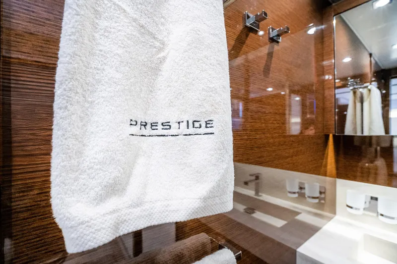 Slide: The Image of Luxurious bathroom interior of 2018 Prestige 630 yacht with branded towel. - 68