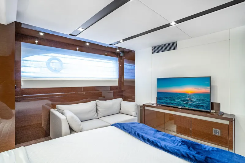 Slide: The Image of Luxurious interior of 2018 Prestige 630 yacht with sofa and TV. - 73