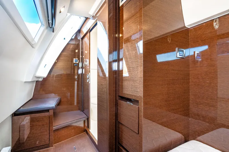Slide: The Image of Luxurious interior of 2018 Prestige 630 yacht with sleek wood finishes and modern design. - 76