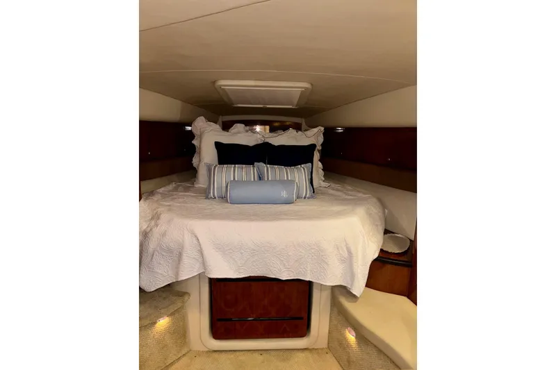 Slide: The Image of Luxurious cabin interior of 2006 Sea Ray 340 Sundancer yacht with cozy bedding. - 40
