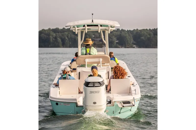 Slide: The Image of Manufacturer Provided Image: 2026 Carolina Skiff 26 Ultra Elite cruising on a lake with passengers enjoying the ride. - 4