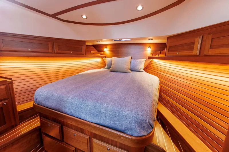Slide: The Image of Luxurious wooden cabin interior of 2022 Sabre 38 SE yacht with cozy bed. - 19