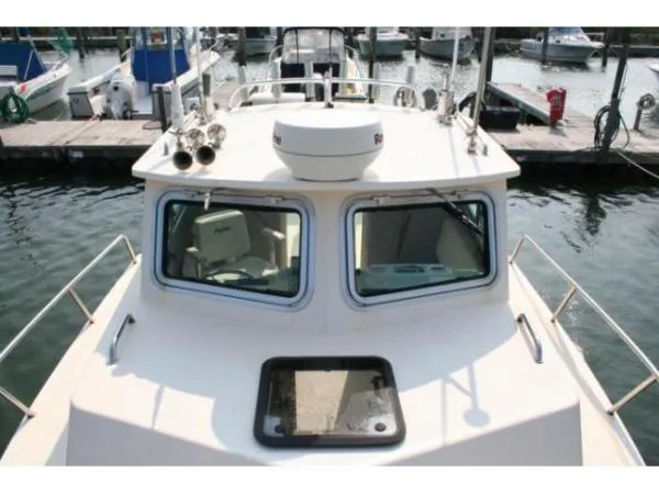 Slide: The Image of Parker Marine Cabin Fisherman 2003 - 1
