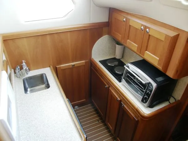 Slide: The Image of Mainship *Flybridge Trawler* 2004 - 5